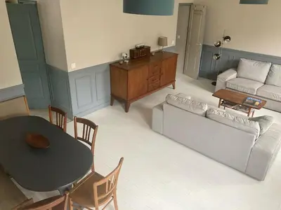 Coin salon dans l'établissement Charmante maison jardin centre