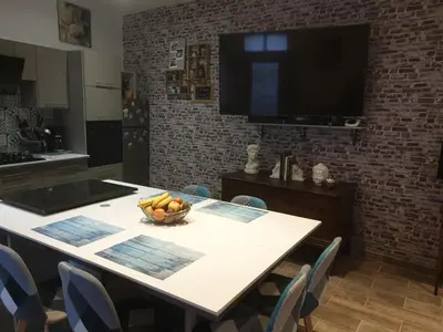 Cuisine ou kitchenette dans l'établissement Une petite campagne en ville