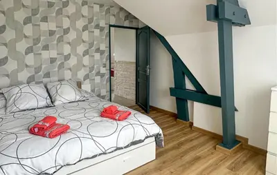 Un ou plusieurs lits dans un hébergement de l'établissement Cozy Home In Blois With Wifi