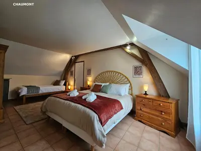 Un ou plusieurs lits dans un hébergement de l'établissement Gites les petits Châteaux
