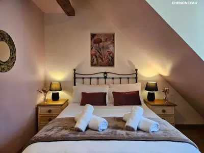 Un ou plusieurs lits dans un hébergement de l'établissement Gites les petits Châteaux