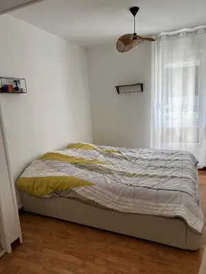 Un ou plusieurs lits dans un hébergement de l'établissement Appartement proche circuit