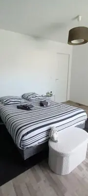 Un ou plusieurs lits dans un hébergement de l'établissement Chambre circuit des 24 heures