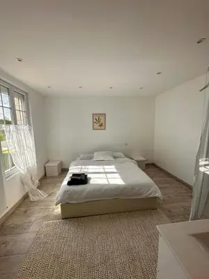 Un ou plusieurs lits dans un hébergement de l'établissement maison dans la Prairie