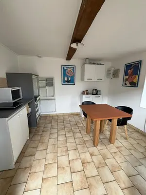 Cuisine ou kitchenette dans l'établissement La petite maison