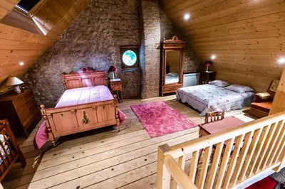 Un ou plusieurs lits dans un hébergement de l'établissement Maison du Garde Forestier au cœur des Châteaux de la Loire