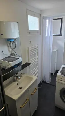 Cuisine ou kitchenette dans l'établissement Maison