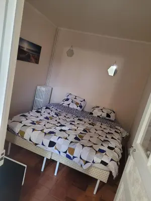 Un ou plusieurs lits dans un hébergement de l'établissement Maison de campagne le Joncher