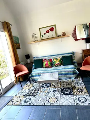 Coin salon dans l'établissement Gîte de beaujours