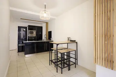 Cuisine ou kitchenette dans l'établissement La Terrasse du Bonheur