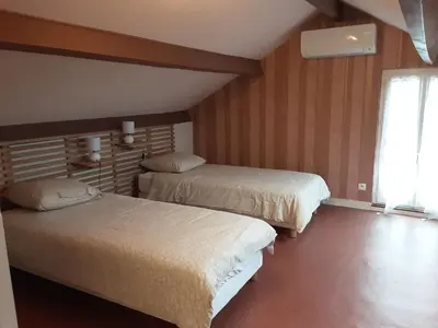 Un ou plusieurs lits dans un hébergement de l'établissement La petite Maison de Niré