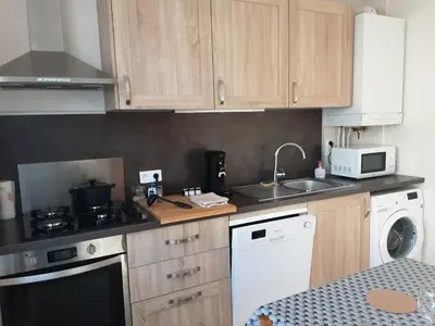 Cuisine ou kitchenette dans l'établissement La petite Maison de Niré