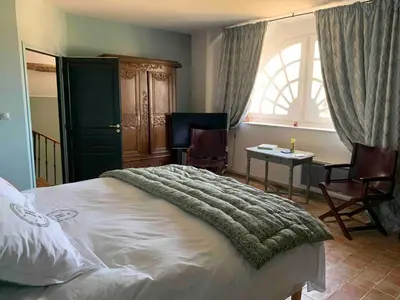 Un ou plusieurs lits dans un hébergement de l'établissement La Grande Maison