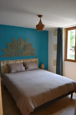 Un ou plusieurs lits dans un hébergement de l'établissement Zélie Gîte