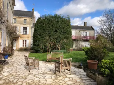 Jardin de l'établissement Le Chai De La Rose SPA et Séances Bien être