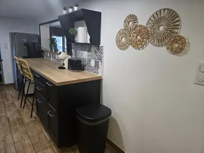 Cuisine ou kitchenette dans l'établissement La Terrasse