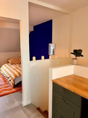 Un ou plusieurs lits dans un hébergement de l'établissement Charming Studio In Le Mans Chasse Royale