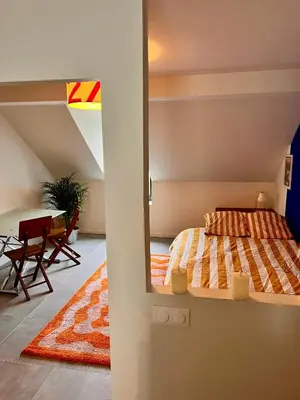 Un ou plusieurs lits dans un hébergement de l'établissement Charming Studio In Le Mans Chasse Royale