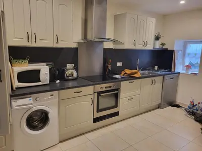 Cuisine ou kitchenette dans l'établissement Domaine les roses du vieux chai