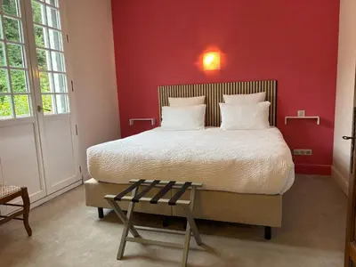 Un ou plusieurs lits dans un hébergement de l'établissement Domaine des Châteaux