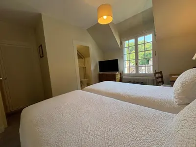 Un ou plusieurs lits dans un hébergement de l'établissement Domaine des Châteaux