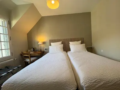 Un ou plusieurs lits dans un hébergement de l'établissement Domaine des Châteaux