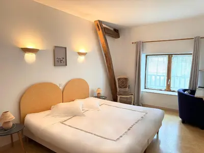 Un ou plusieurs lits dans un hébergement de l'établissement Hôtel de l Héritage