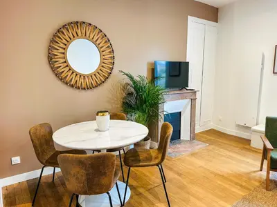 Télévision ou salle de divertissement dans l'établissement La Suite Saint-Martin