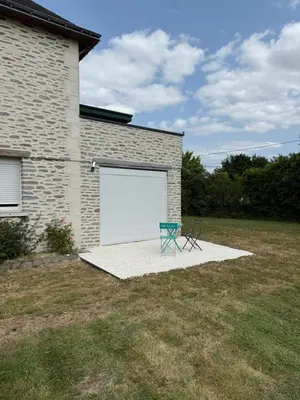 Jardin de l'établissement Appartement type 2 à corné