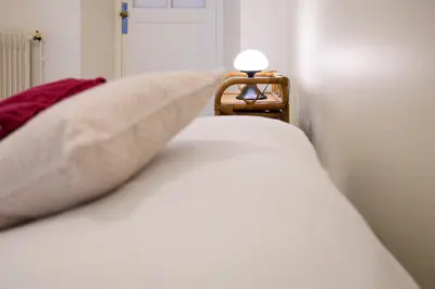 Un ou plusieurs lits dans un hébergement de l'établissement Trois pièces de charme hyper centre Tours