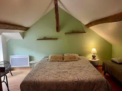 Un ou plusieurs lits dans un hébergement de l'établissement Détente aux beaumonts