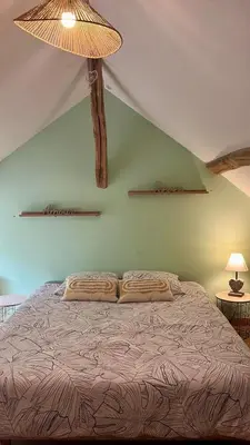 Un ou plusieurs lits dans un hébergement de l'établissement Détente aux beaumonts