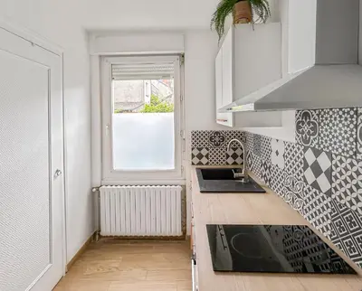 Cuisine ou kitchenette dans l'établissement Cosy et calme, lit double, proche transports