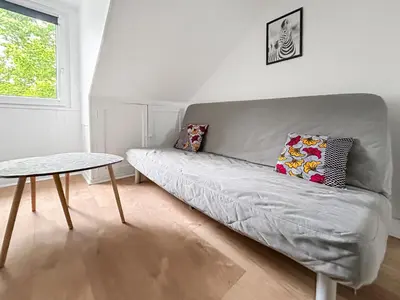 Un ou plusieurs lits dans un hébergement de l'établissement Douillet studio avec Wi-Fi, proche Transports