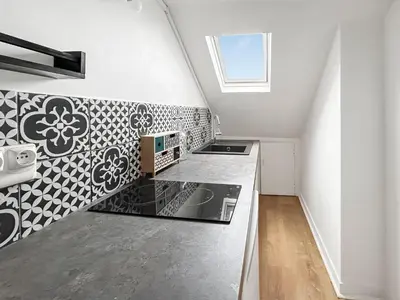 Cuisine ou kitchenette dans l'établissement Douillet studio avec Wi-Fi, proche Transports