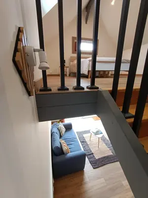 Coin salon dans l'établissement Studio en duplex 24H du Mans