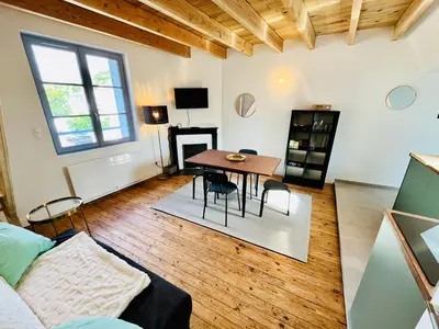 Télévision ou salle de divertissement dans l'établissement Centre-ville, cathédrale, cosy, duplex, le numéro 12