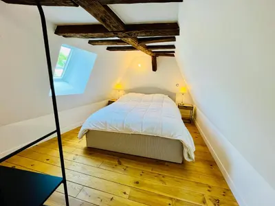 Un ou plusieurs lits dans un hébergement de l'établissement Centre-ville, cathédrale, cosy, duplex, le numéro 12