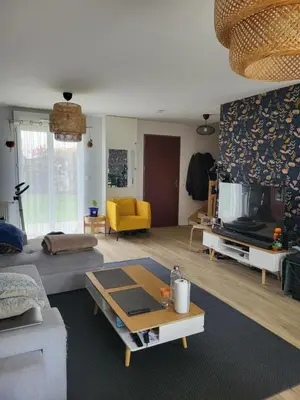 Coin salon dans l'établissement Chambre chez l'habitant