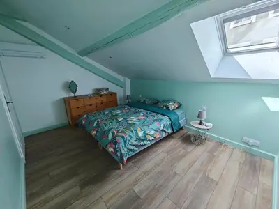 Un ou plusieurs lits dans un hébergement de l'établissement Appartement de charme à Amboise face à la Loire