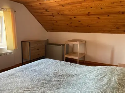 Un ou plusieurs lits dans un hébergement de l'établissement La Maisonnette