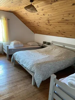 Un ou plusieurs lits dans un hébergement de l'établissement La Maisonnette