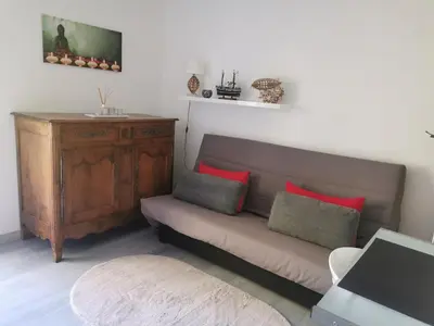 Coin salon dans l'établissement Villa 5km du circuit 24h Le Mans