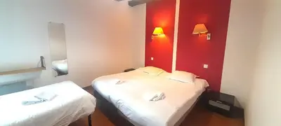 Un ou plusieurs lits dans un hébergement de l'établissement Maison de ville idéale pour groupes et familles