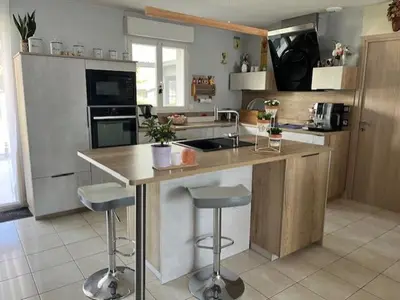 Cuisine ou kitchenette dans l'établissement location Chambres proximite du circuit 24 h