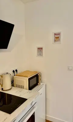 Cuisine ou kitchenette dans l'établissement Les Chouettes