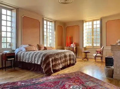 Un ou plusieurs lits dans un hébergement de l'établissement Restored Castle In The Heart Of Loire Valley