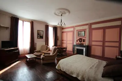 Coin salon dans l'établissement Domaine Des Roses