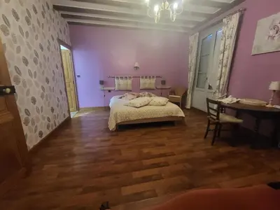 Un ou plusieurs lits dans un hébergement de l'établissement Gîte la renaissance