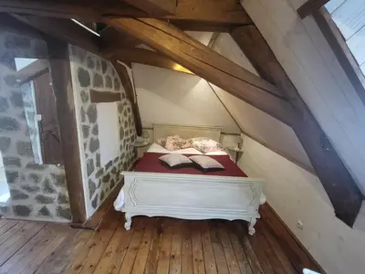 Un ou plusieurs lits dans un hébergement de l'établissement Gîte la renaissance